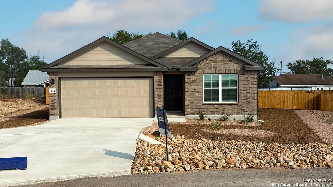 Front exterior of a new home in High Garden, Comfort, TX, highlighting curb appeal (Image 2). Front exterior of a new home in High Garden, Comfort, TX, highlighting curb appeal (Image 2).