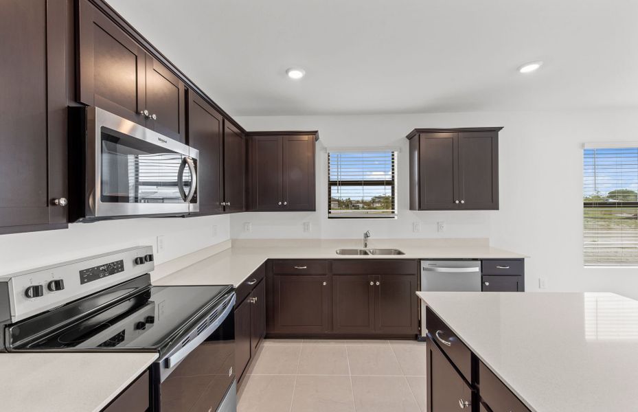 Furnished interior view inside a new home in Whispering Lakes, Lehigh Acres (Image 7).