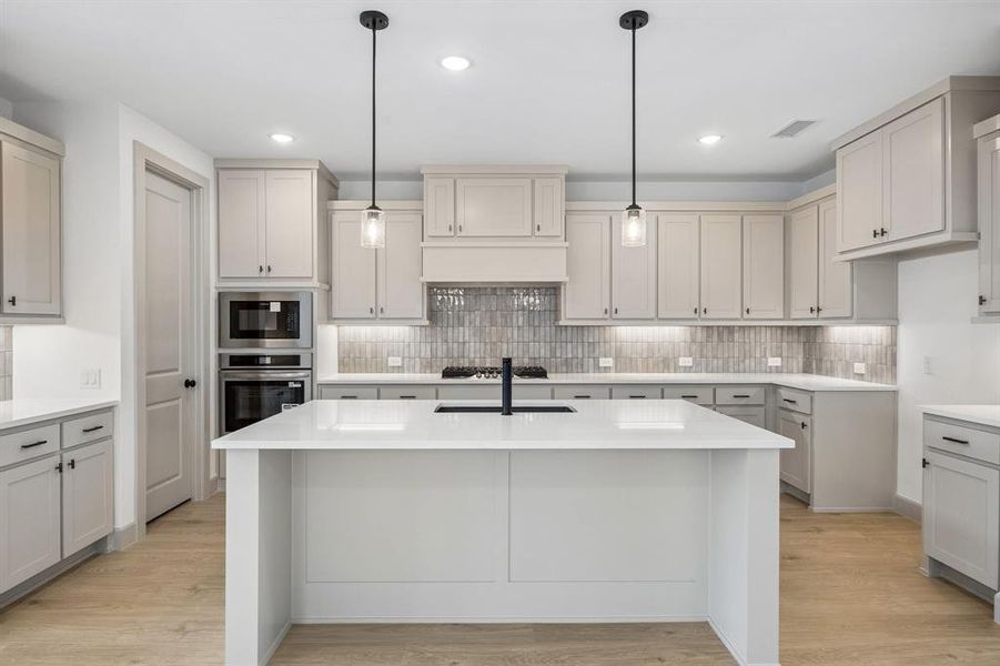 Welcome to your dream kitchen featuring ample storage and prep space that is sure to please all the chef's in the family!