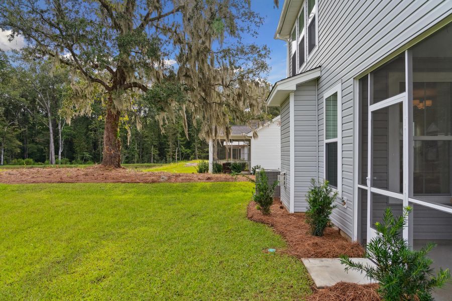 Exterior details and patio area of a home in Sweetgrass Station, Summerville (Image 32). Exterior details and patio area of a home in Sweetgrass Station, Summerville (Image 32).