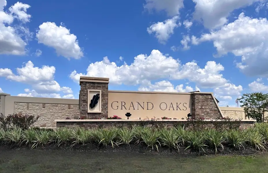 Front exterior of a new home in Grand Oaks Village, Houston, TX, highlighting curb appeal (Image 2). Front exterior of a new home in Grand Oaks Village, Houston, TX, highlighting curb appeal (Image 2).