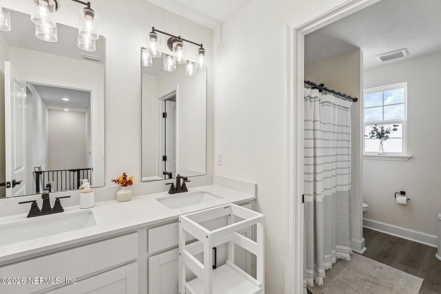 Furnished interior view inside a new home in Seasons at Morada, St. Augustine (Image 11).