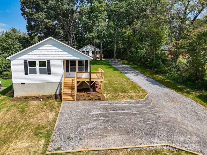 Front exterior of a new home in , Asheville, NC, highlighting curb appeal (Image 1).