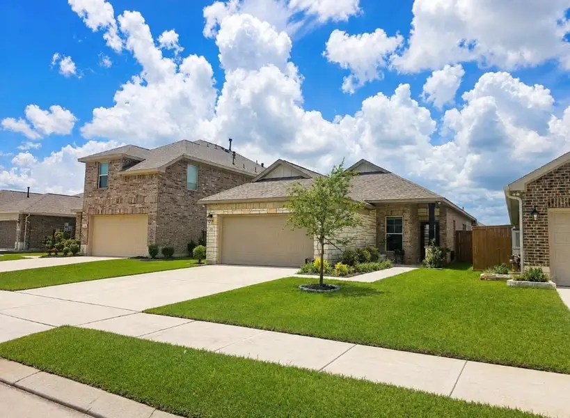 Front exterior of a new home in , Beasley, TX, highlighting curb appeal (Image 1). Front exterior of a new home in , Beasley, TX, highlighting curb appeal (Image 1).