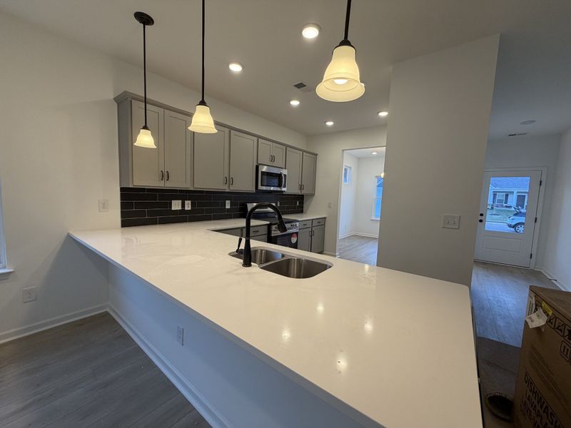 Furnished interior view inside a new home in Marlin Pointe, White House (Image 3).