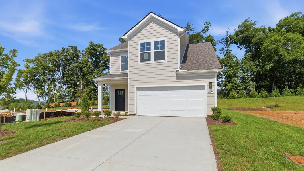 Exterior with 2-car garage