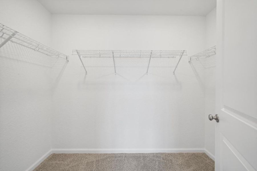 Primary Suite Walk in Closet Primary Suite Walk in Closet