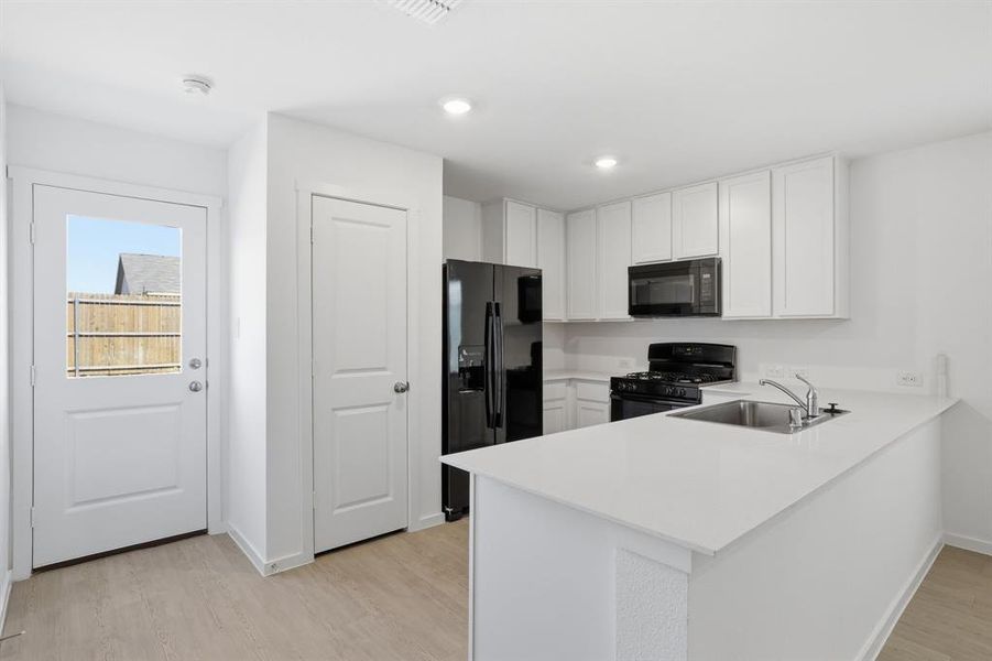 Furnished interior view inside a new home in Falcon Heights, Forney (Image 10).