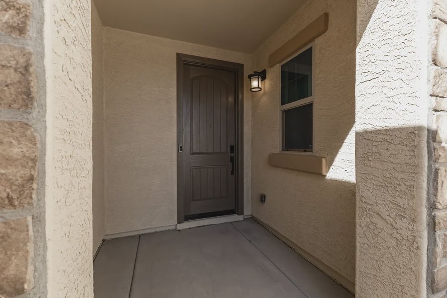 Exterior details and patio area of a home in Forté at Granite Vista, Waddell (Image 3).