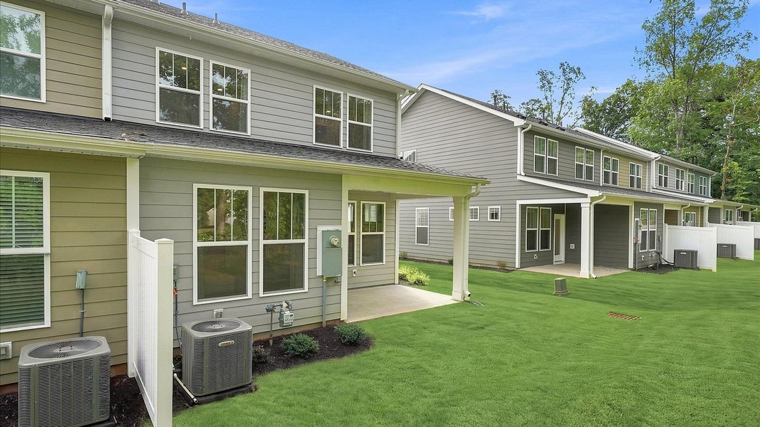 Exclusive rear covered porch with accomplished detail and elevated outdoor living potential of the Lawson design