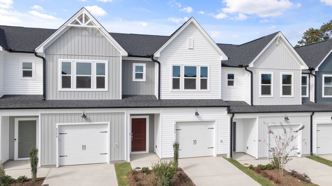 Front exterior of a new home in McConnell Ridge, McLeansville, NC, highlighting curb appeal (Image 14). Front exterior of a new home in McConnell Ridge, McLeansville, NC, highlighting curb appeal (Image 14).