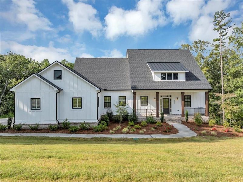 Front exterior of a new home in , Ball Ground, GA, highlighting curb appeal (Image 25).
