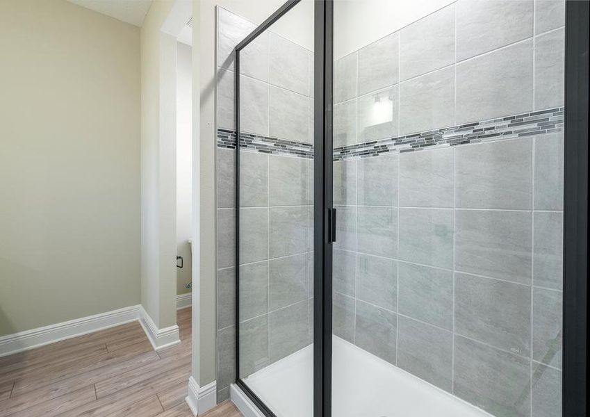 The master bathroom includes a huge walk-in shower.