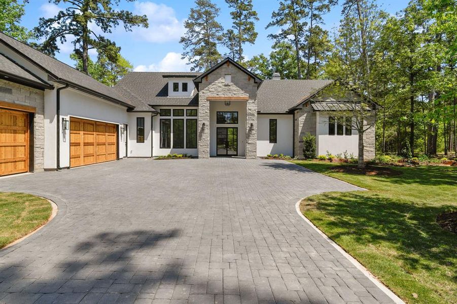 Front exterior of a new home in , Montgomery, TX, highlighting curb appeal (Image 1).