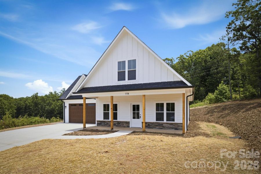 Front exterior of a new home in , Valdese, NC, highlighting curb appeal (Image 18). Front exterior of a new home in , Valdese, NC, highlighting curb appeal (Image 18).