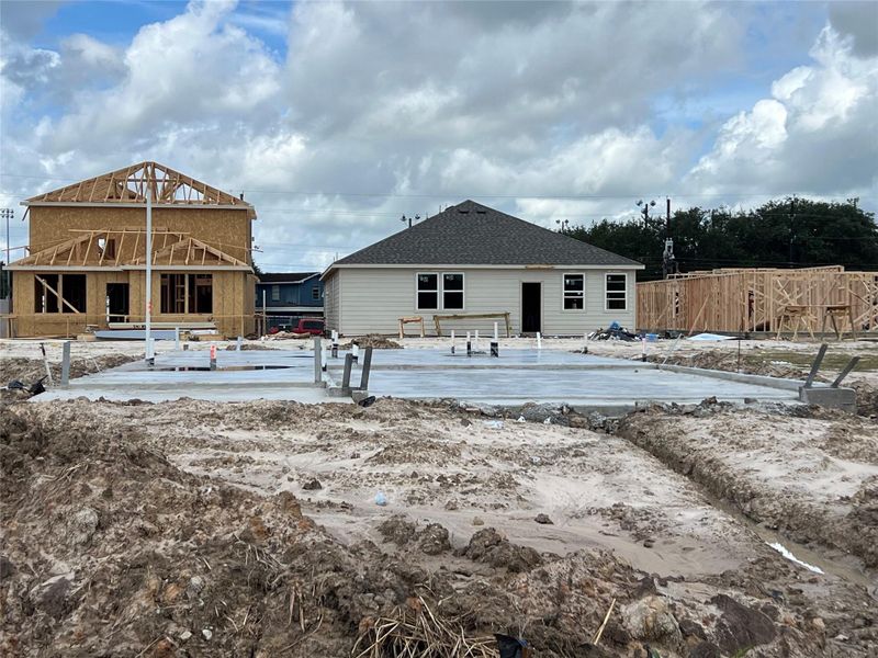 Front exterior of a new home in Valor Park, Bay City, TX, highlighting curb appeal (Image 2).
