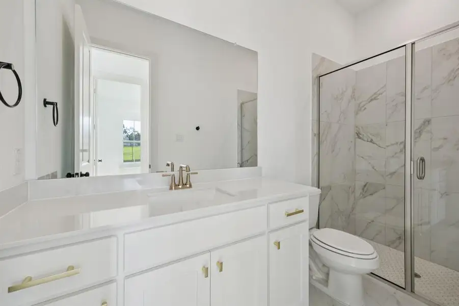 Friends and family will feel right at home in any of the beautifully finished guest baths in our Madeleine plan. Friends and family will feel right at home in any of the beautifully finished guest baths in our Madeleine plan.