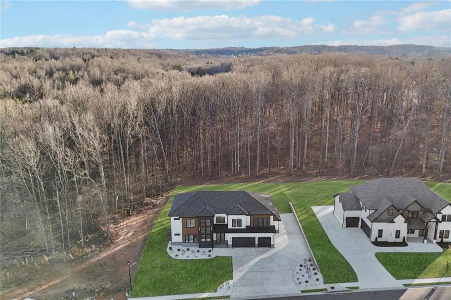 Front exterior of a new home in , Auburn, GA, highlighting curb appeal (Image 34). Front exterior of a new home in , Auburn, GA, highlighting curb appeal (Image 34).