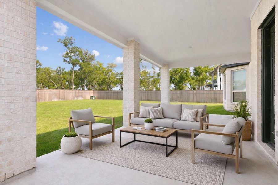 Serene and spacious patio staged perfectly for relaxation and entertaining, featuring stylish outdoor seating with lush green views. Serene and spacious patio staged perfectly for relaxation and entertaining, featuring stylish outdoor seating with lush green views.