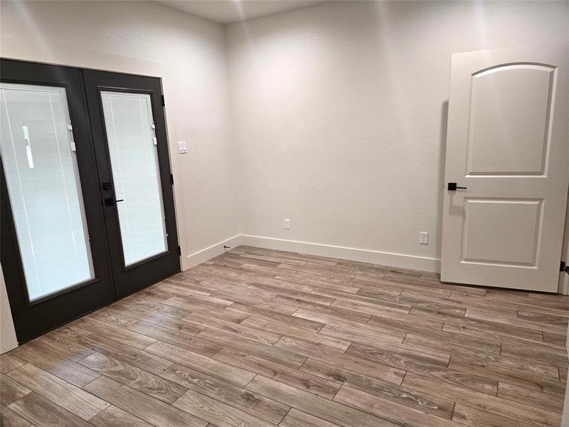 Large Secondary Bedroom with "wood look" ceramic tile floors absolutely gorgeous! Large Secondary Bedroom with "wood look" ceramic tile floors absolutely gorgeous!