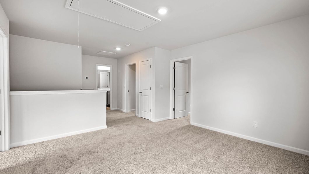 Representative unfurnished interior of a home built from the Biltmore by D.R. Horton in Woodglen, Piedmont (Image 20).