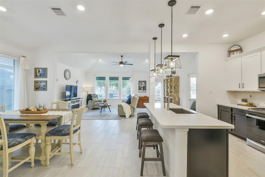 The common areas are thoughtfully arranged. Cook and serve meals with ease with the conveniently located dining area and kitchen!