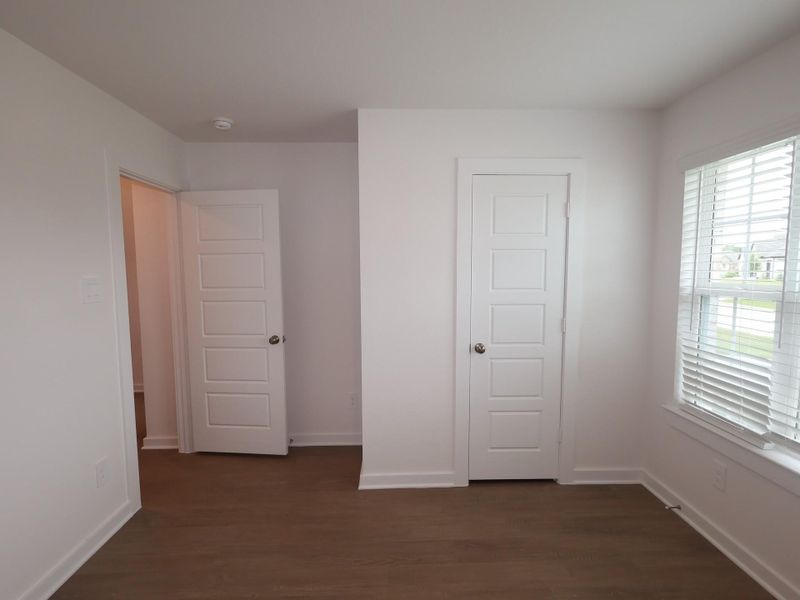 Spacious, unfurnished interior of a new home in Pinewood at Grand Texas, New Caney (Image 26). Spacious, unfurnished interior of a new home in Pinewood at Grand Texas, New Caney (Image 26).