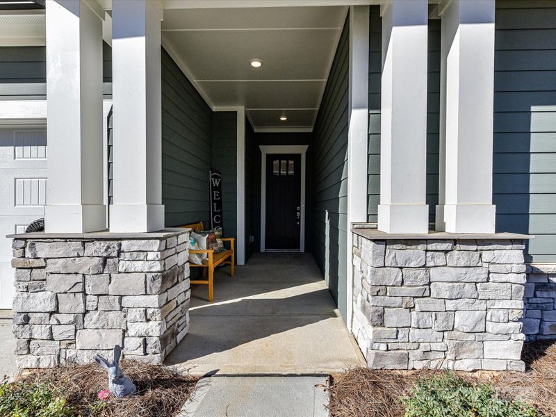 Exterior details and patio area of a home in Encore at Streamside - Tradition Series, Waxhaw (Image 34).