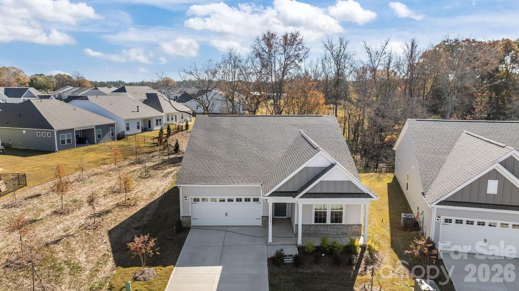 Front exterior of a new home in Cottages at Wingate, Wingate, NC, highlighting curb appeal (Image 17). Front exterior of a new home in Cottages at Wingate, Wingate, NC, highlighting curb appeal (Image 17).