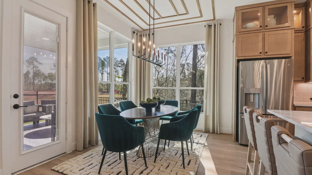 Representative furnished interior of a home built from the Marbella by Chesmar Homes in Audubon, Magnolia (Image 12).