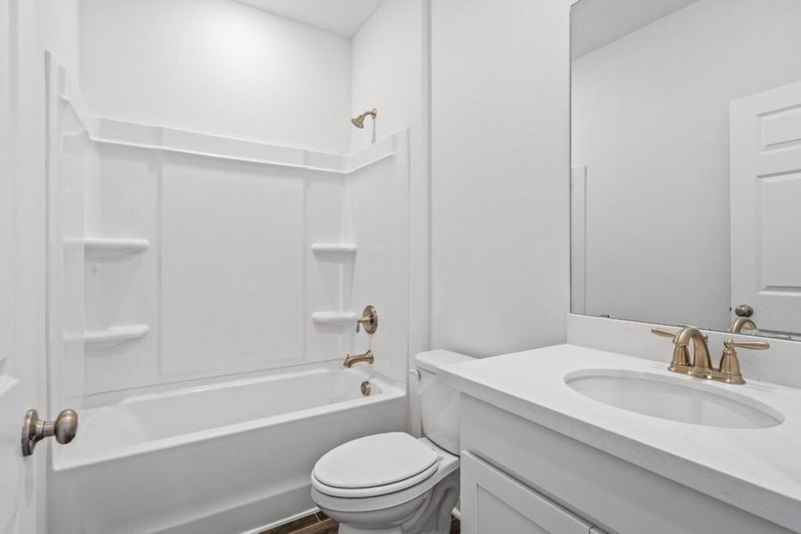 Furnished interior view inside a new home in Natureview, Freeport (Image 11).