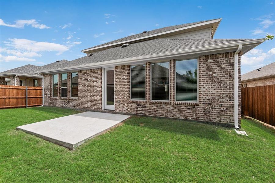 Front exterior of a new home in Villages of Hurricane Creek, Anna, TX, highlighting curb appeal (Image 2). Front exterior of a new home in Villages of Hurricane Creek, Anna, TX, highlighting curb appeal (Image 2).
