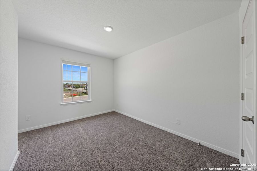 Spacious, unfurnished interior of a new home in The Preserve at Candlemeadow, San Antonio (Image 32).