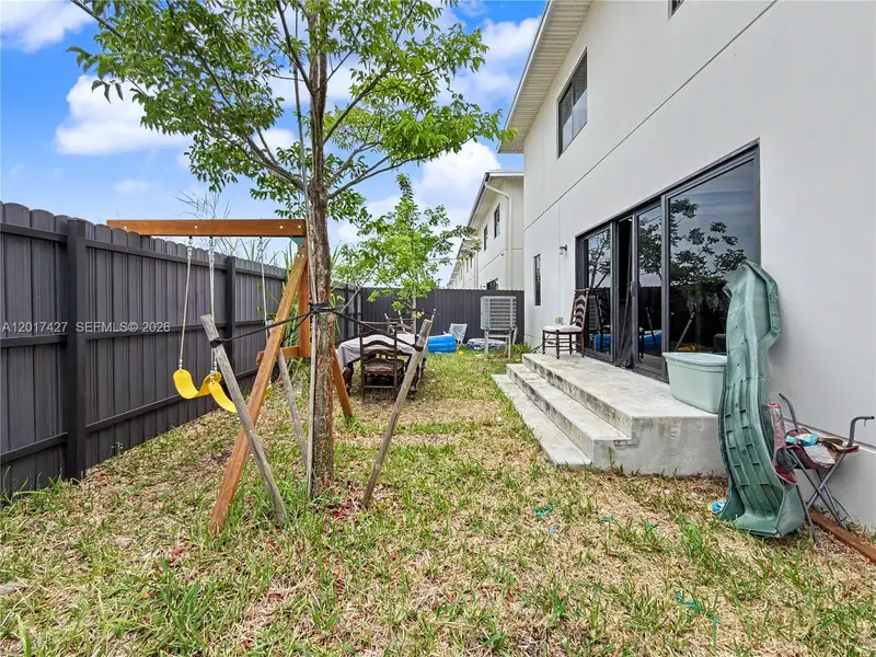 Exterior details and patio area of a home in , Florida City (Image 4).