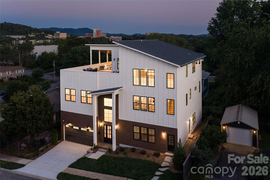 Front exterior of a new home in , Asheville, NC, highlighting curb appeal (Image 2). Front exterior of a new home in , Asheville, NC, highlighting curb appeal (Image 2).