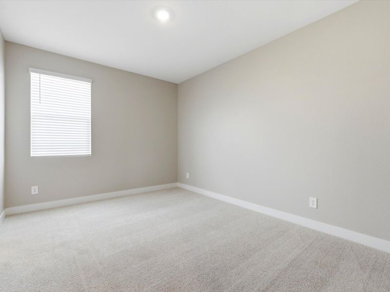 Spacious, unfurnished interior of a new home in White Tank Foothills Signature Series, Waddell (Image 17).
