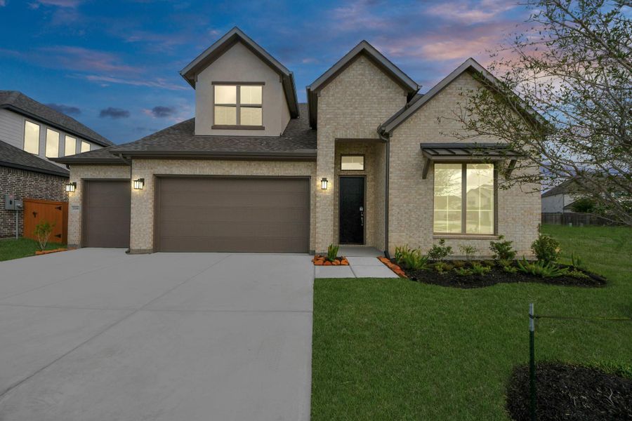 Front exterior of a new home in Marvida, Cypress, TX, highlighting curb appeal (Image 2).