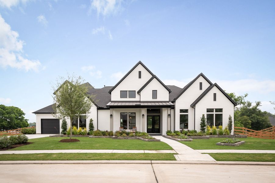 Representative exterior photo of a completed home built from the Meritage by Tri Pointe Homes in The Estates at James Lane, Fulshear, TX (Image 21).