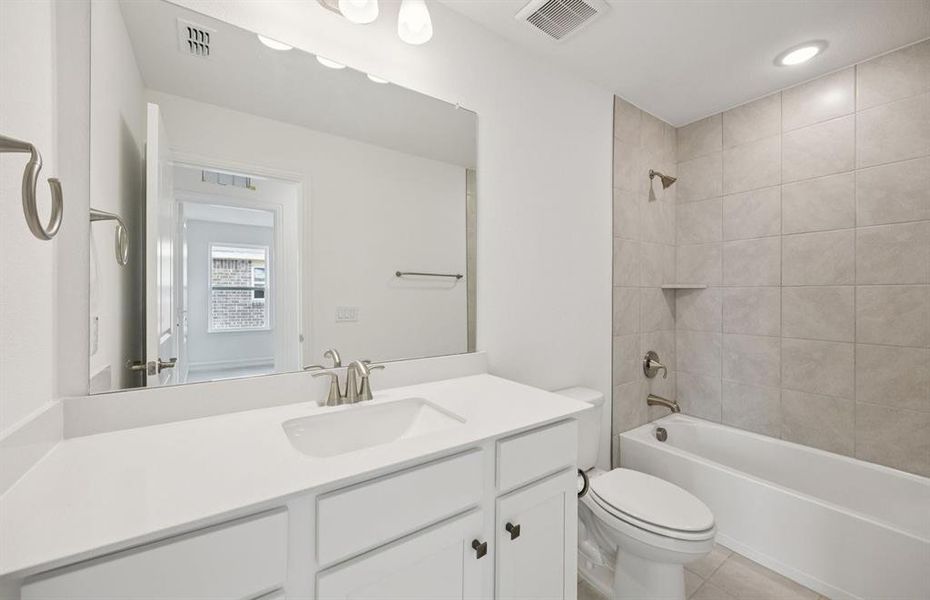 Stylish secondary bath with high-end fixtures *Real home pictured Stylish secondary bath with high-end fixtures *Real home pictured