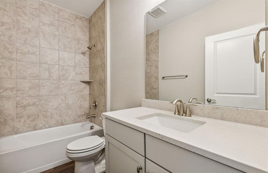 Upgraded secondary bathroom*real home pictured