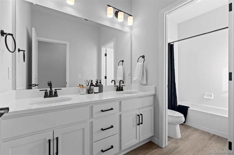 Furnished interior view inside a new home in Trails at Smoky Hill, Parker (Image 25).