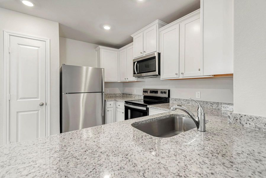 Furnished interior view inside a new home in Vacek Country Meadows, Richmond (Image 3).