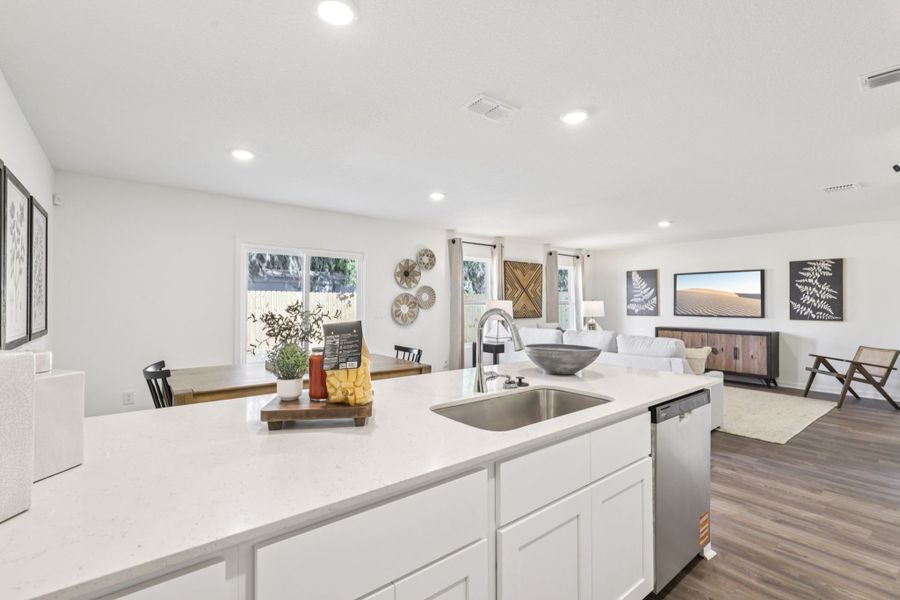 A kitchen with a large island. A kitchen with a large island.