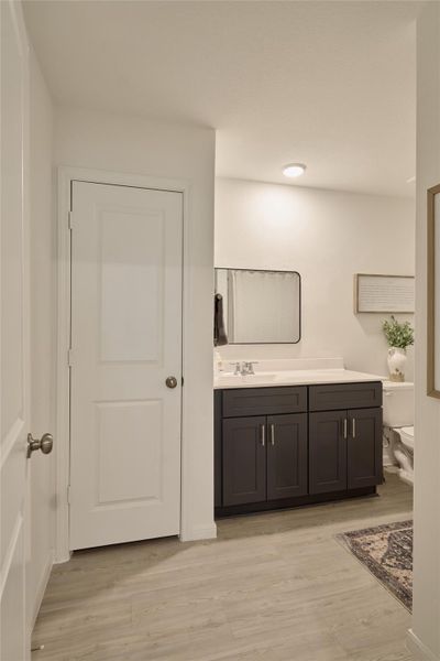 Furnished interior view inside a new home in The Pines At Seven Coves, Willis (Image 32).
