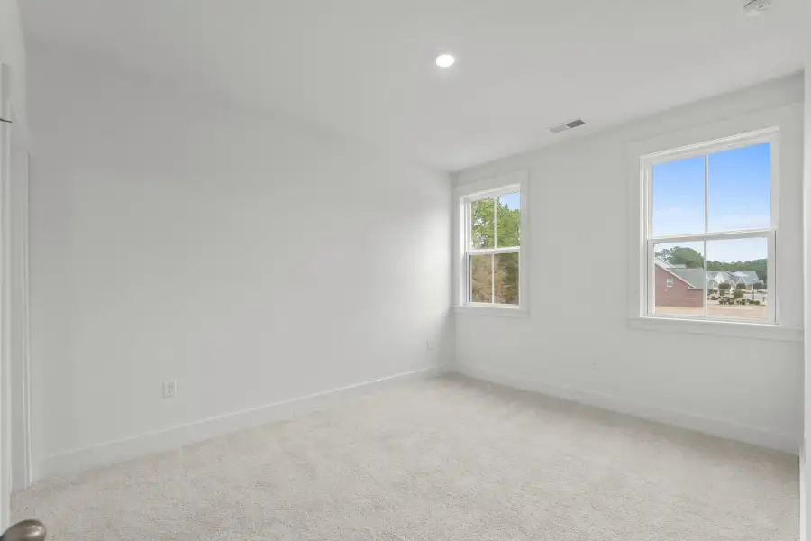 Spacious, unfurnished interior of a new home in Long Bay Golf Club, Longs (Image 35). Spacious, unfurnished interior of a new home in Long Bay Golf Club, Longs (Image 35).