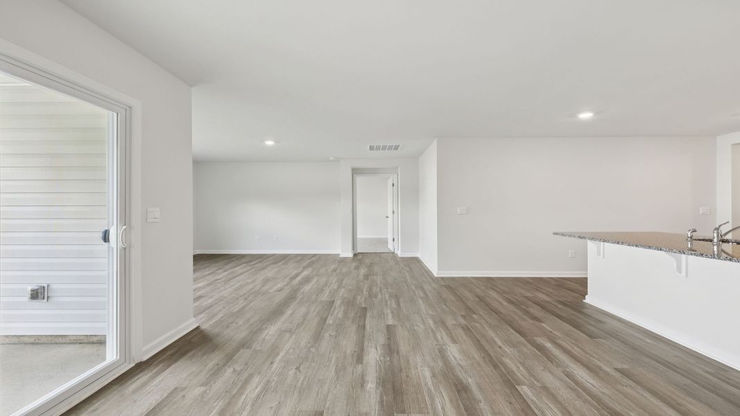 Spacious, unfurnished interior of a new home in Bentley Park, Greenwood (Image 23).