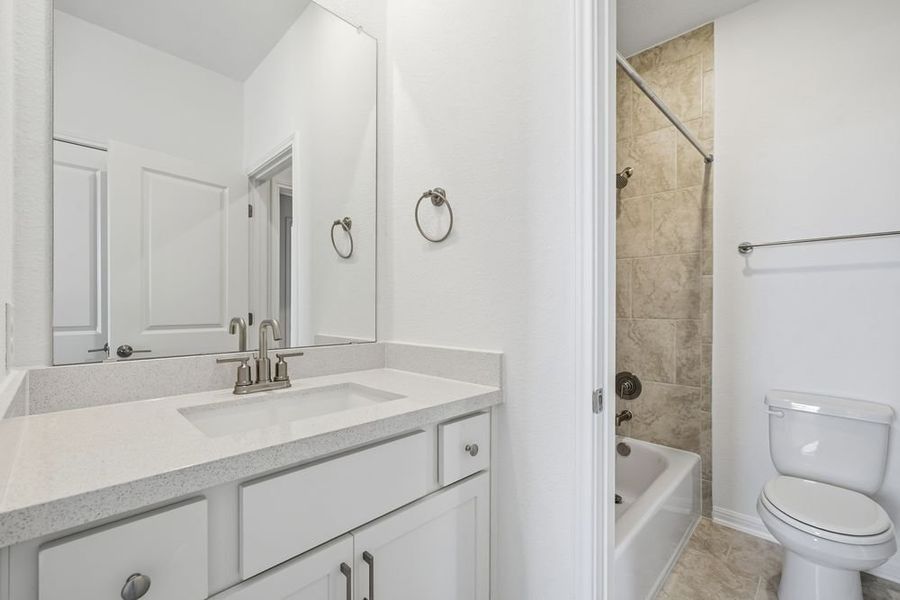 Furnished interior view inside a new home in Parkside on the River 60s, Georgetown (Image 8).