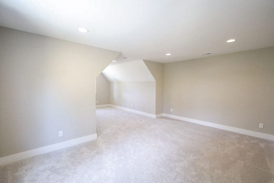 Spacious, unfurnished interior of a new home in Baker Road, Birchwood (Image 75).