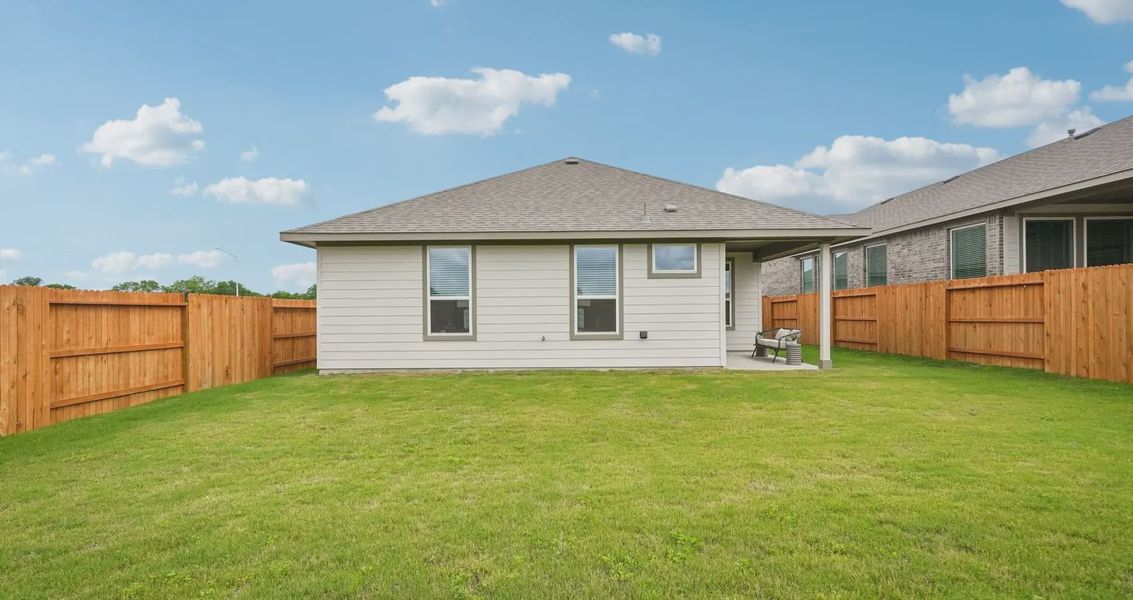 Exterior details and patio area of a home in Stream Waters, Buda (Image 15).