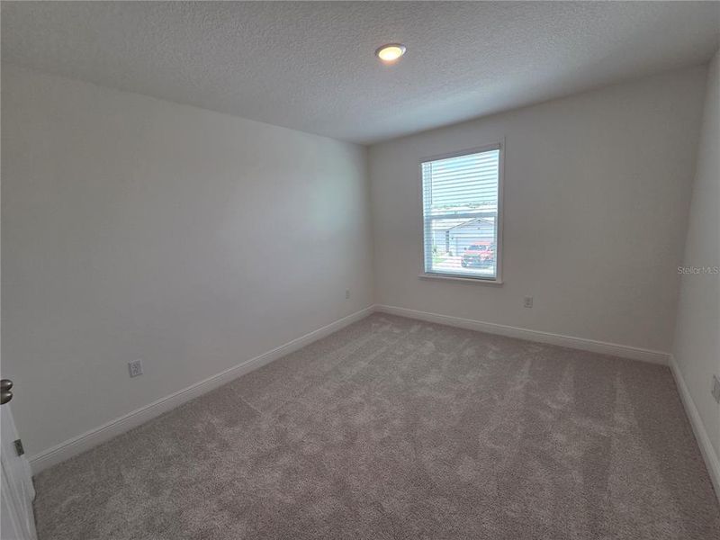 Spacious, unfurnished interior of a new home in Villamar, Winter Haven (Image 37).